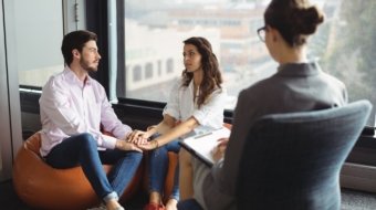 Couple talking to a marriage counselor