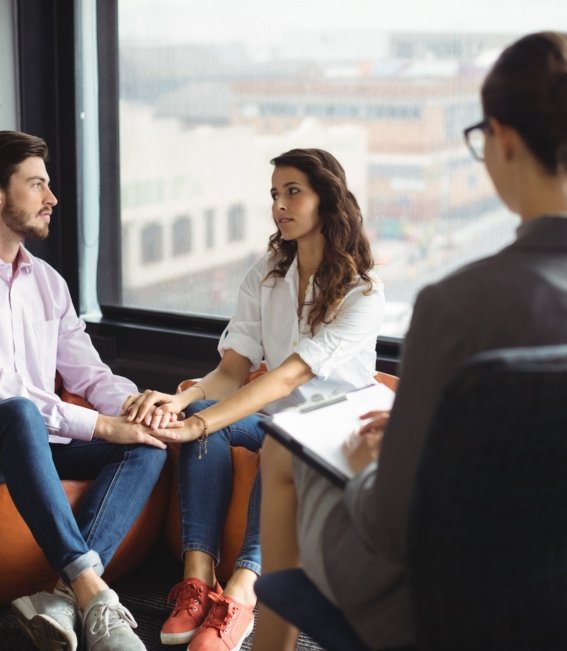 Couple talking to a marriage counselor